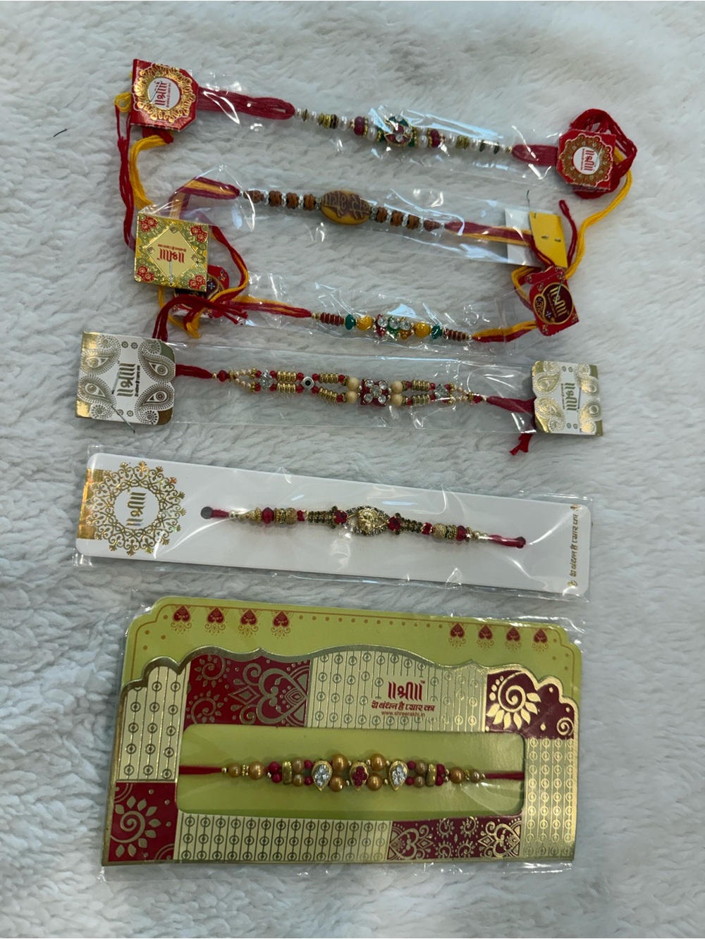 Traditional Red and Gold Rakhi Bracelet - Festive Women's Accessory